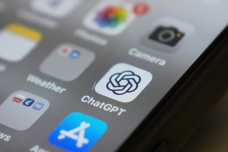 The ChatGPT app icon is seen on a smartphone screen.