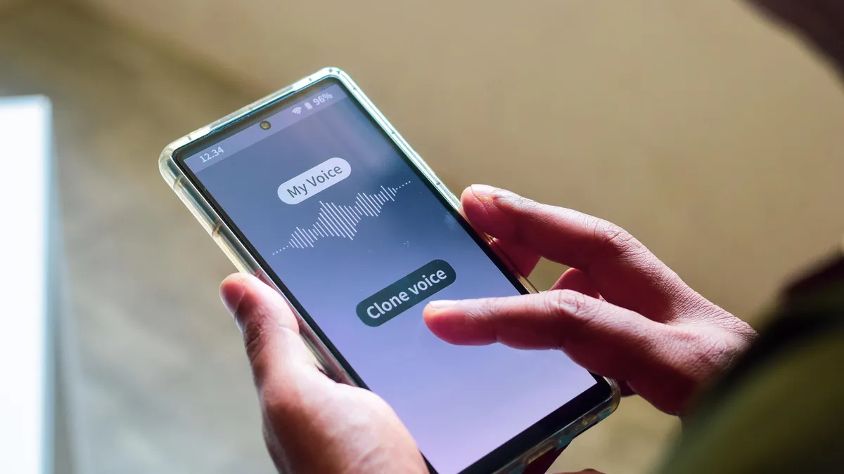 Someone using a voice cloning program on their phone.