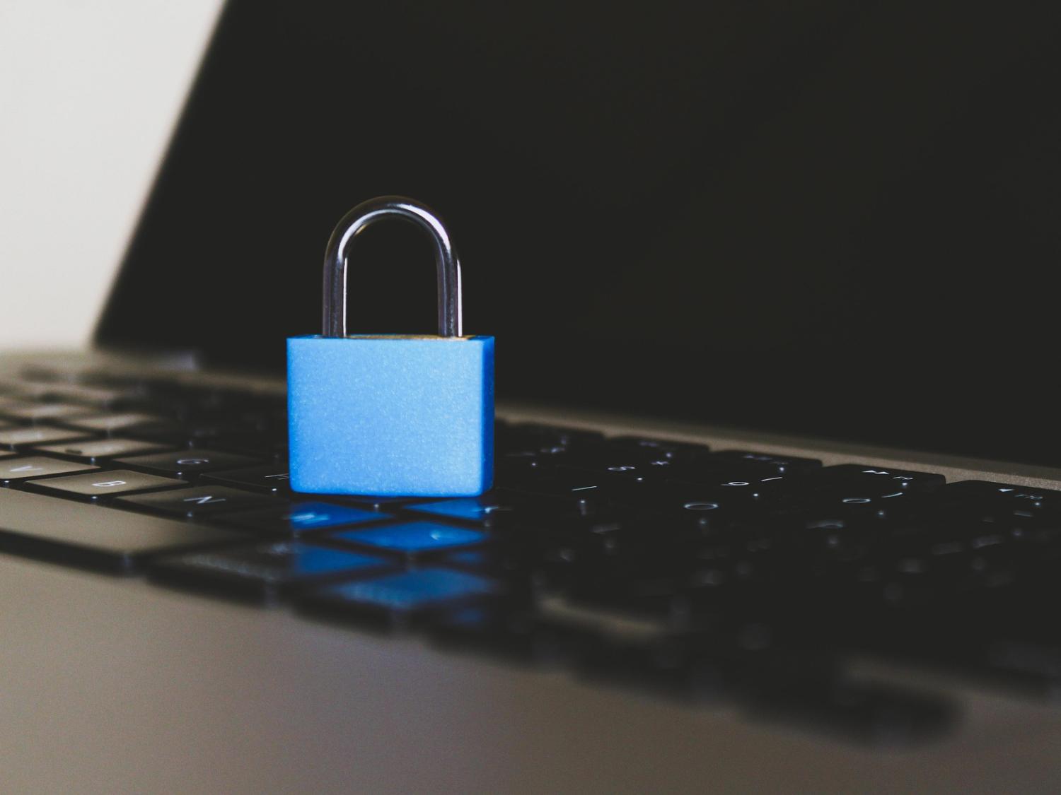 Photo of a lock on top of a computer