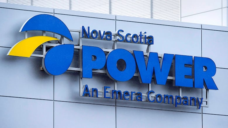 a sign on a gray building says "Nova Scotia Power an Emera Company."